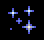[four blue sparks on a black background]